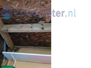 Loodgieter Lekkage plat dak Lekkage van het dak van de schuur