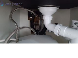 Loodgieter inlaatcombinatie Inlaatcombinatie loopt over
